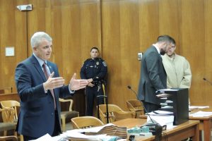 Prosecutor David Calviello, defense attorney Adam Lustberg, defendant Michael Puig