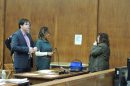 Defense attorney Ron Bar-Nadav of Hackensack, defendant Jamilet Huertas, interpreter Joan Acevedo