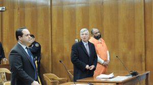 Prosecutor Anthony Talarico, defense attorney Michael DeBlis, defendant Michael Sampson